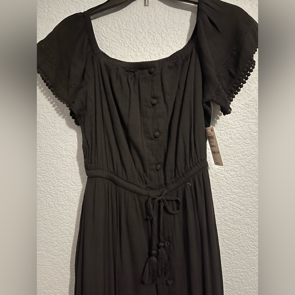 Black Off shoulder/on shoulder black hi-low dress.